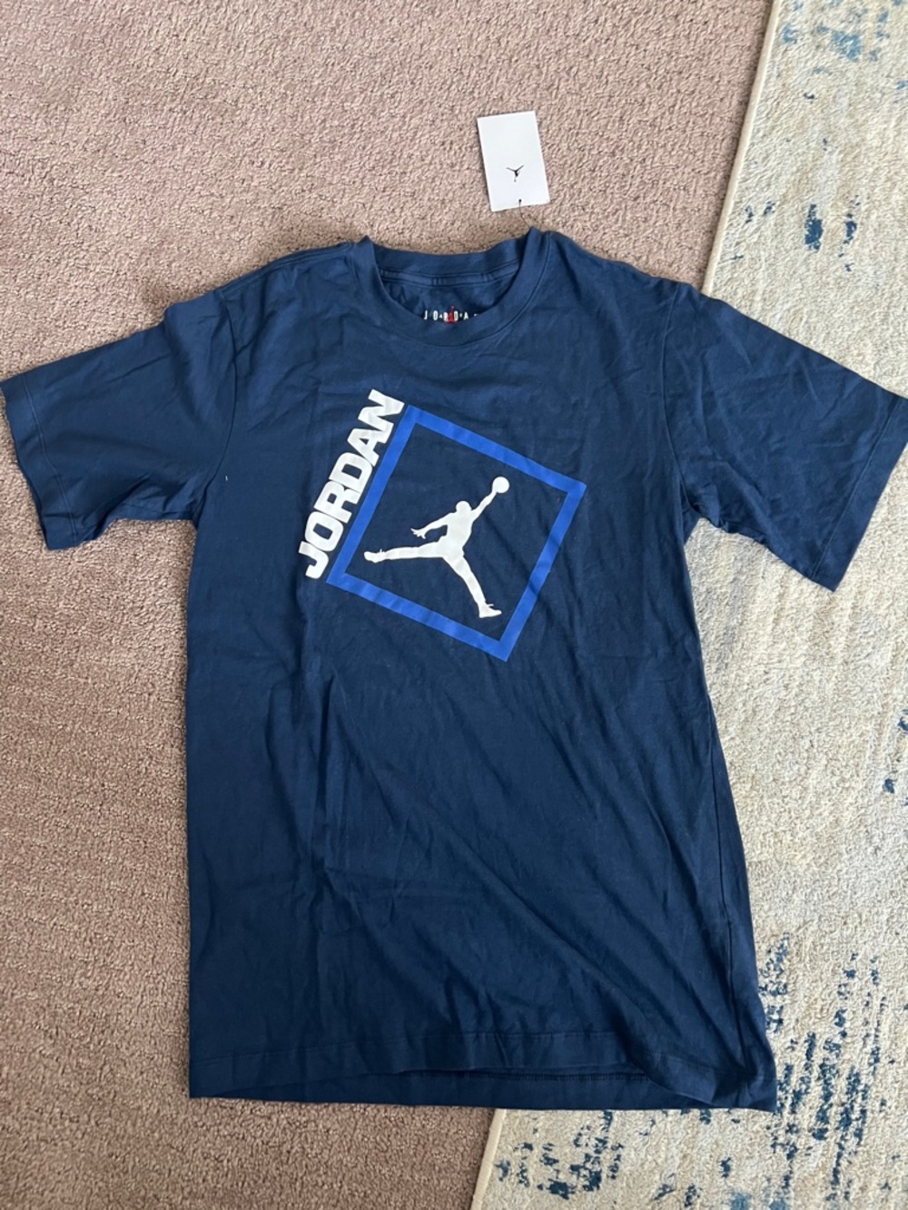Jordan Navy Short Sleeve Tee with White and Blue Jumpman Graphic